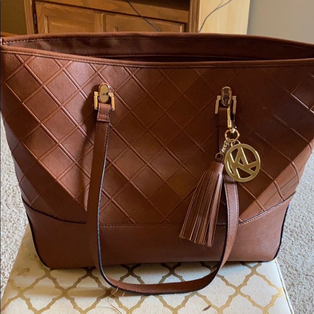 Tan Kate Landry tassel purse